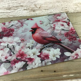 Male Cardinal and Flowers Glass Cutting Board