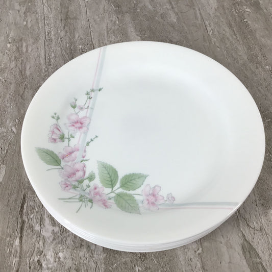 Corelle Veranda White plate with floral design on a wooden surface
