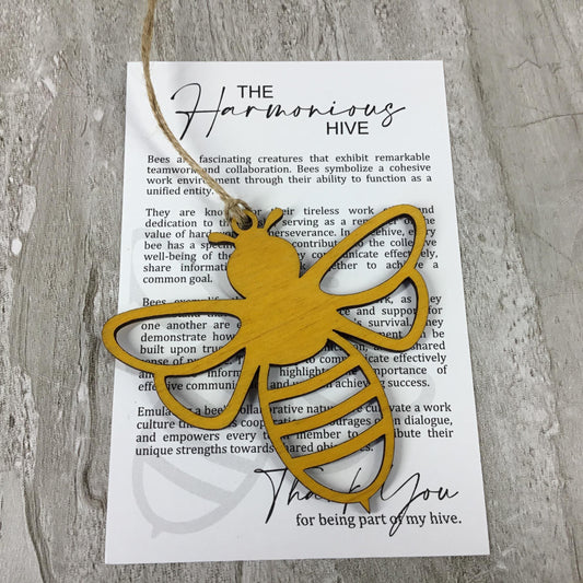 The Harmonious Hive Bee Story Card Ornament Yellow Finished Wood