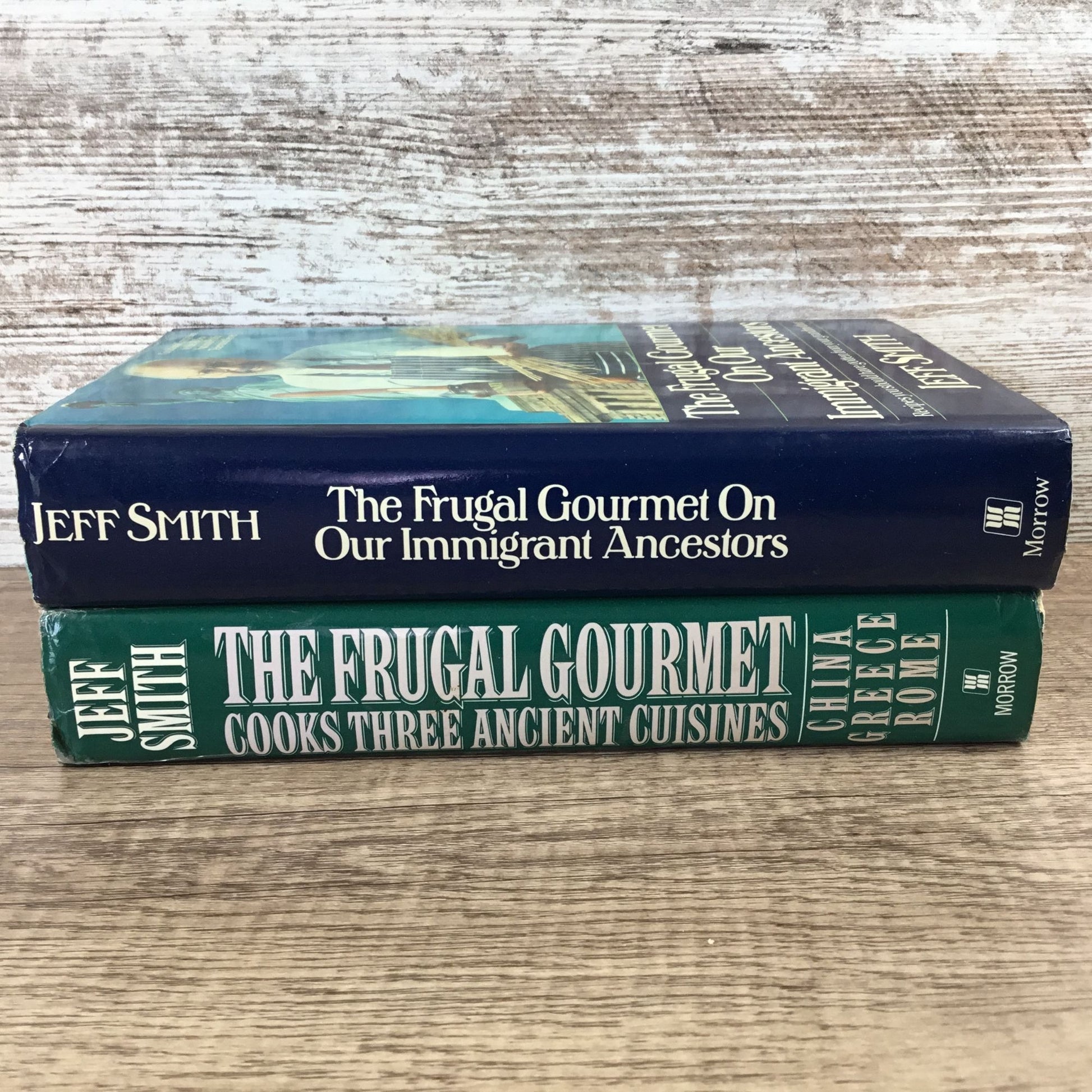 Two cook books by Jeff Smith on a wooden surface