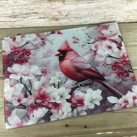 Male Cardinal and Flowers Glass Cutting Board