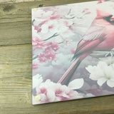 Male Cardinal and Flowers Glass Cutting Board