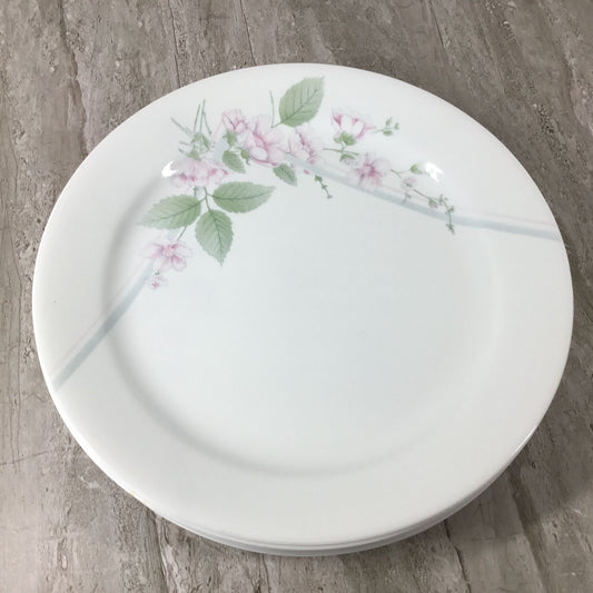Correlle Veranda White plate with floral design on a wooden surface 